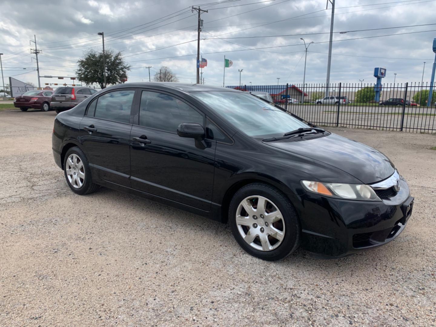 2010 Black /gray Honda Civic LX Sedan (19XFA1F56AE) with an 1.8L L4 SOHC 16V engine, Automatic transmission, located at 1830 North Belt Line Road, Irving, TX, 75061, (469) 524-0199, 32.834373, -96.993584 - Photo#8